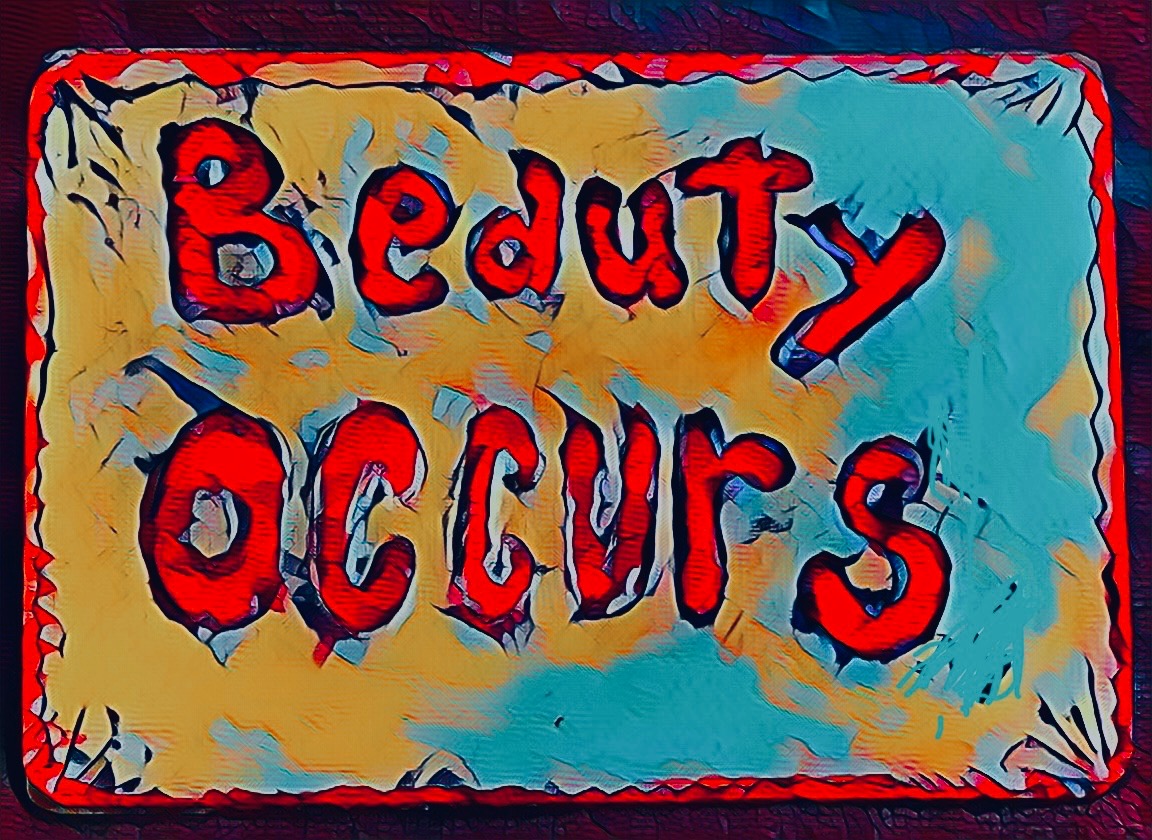 The words 'Beauty Occurs' in bold red lettering on a warm gold and teal background